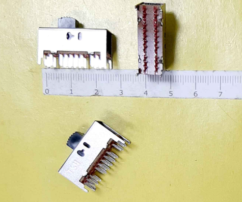 Переключатель движковый (ползунковый), 16pin, 3 полож., ON-ON с фиксацией, под пайку, 23x9x9мм, L=9мм, DIP, корпус: стальной (3P SS23F19G8)