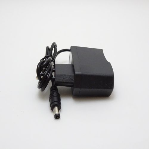 Блок питания импульсный, 12V, 1.0A, 12W, штекер: 5,5 х 2,5мм, В розетку, 75x40x30мм, вх: AC 110-240V KG-1210 фото 2